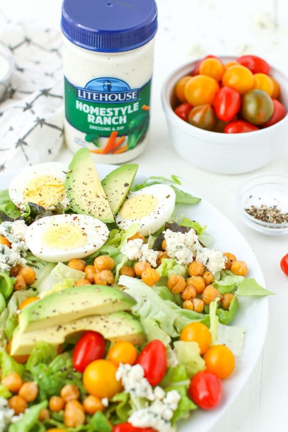 Adding garnish to Vegetarian Cobb Salad