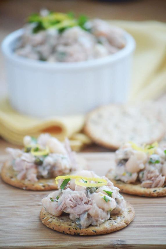 Crackers topped with Mediterranean White Bean and Tuna Salad